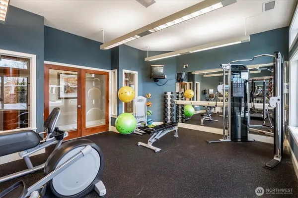 a view of a room with gym equipment