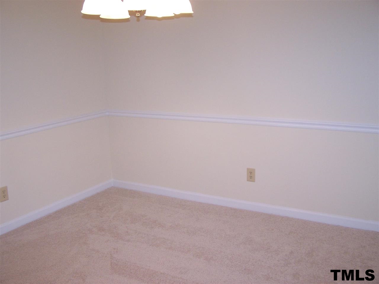 17 Sanders Road Benson, NC 27504 - Photo 5 of 18 a view of an empty room
