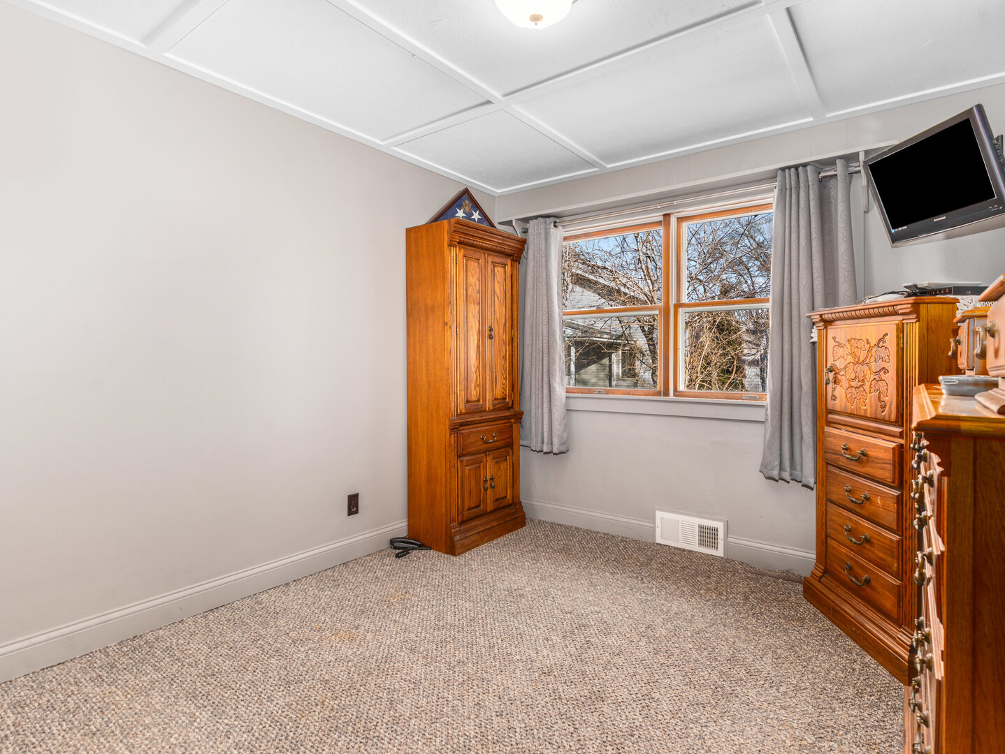 17902 Locust Street Lansing, IL 60438 - Photo 11 of 15 an empty room with wooden floor and windows