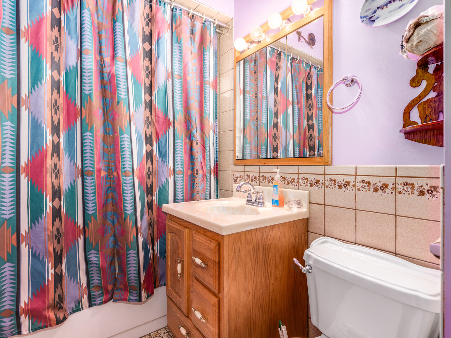 17902 Locust Street Lansing, IL 60438 - Photo 12 of 15 a bathroom with a sink and a toilet