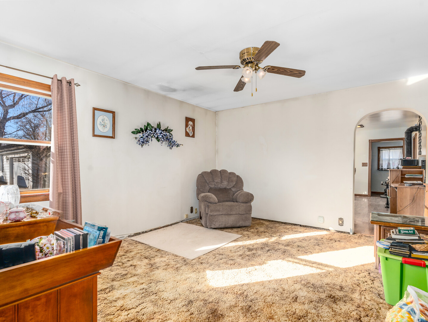 17902 Locust Street Lansing, IL 60438 - Photo 15 of 15 a bedroom with a bed and a couch