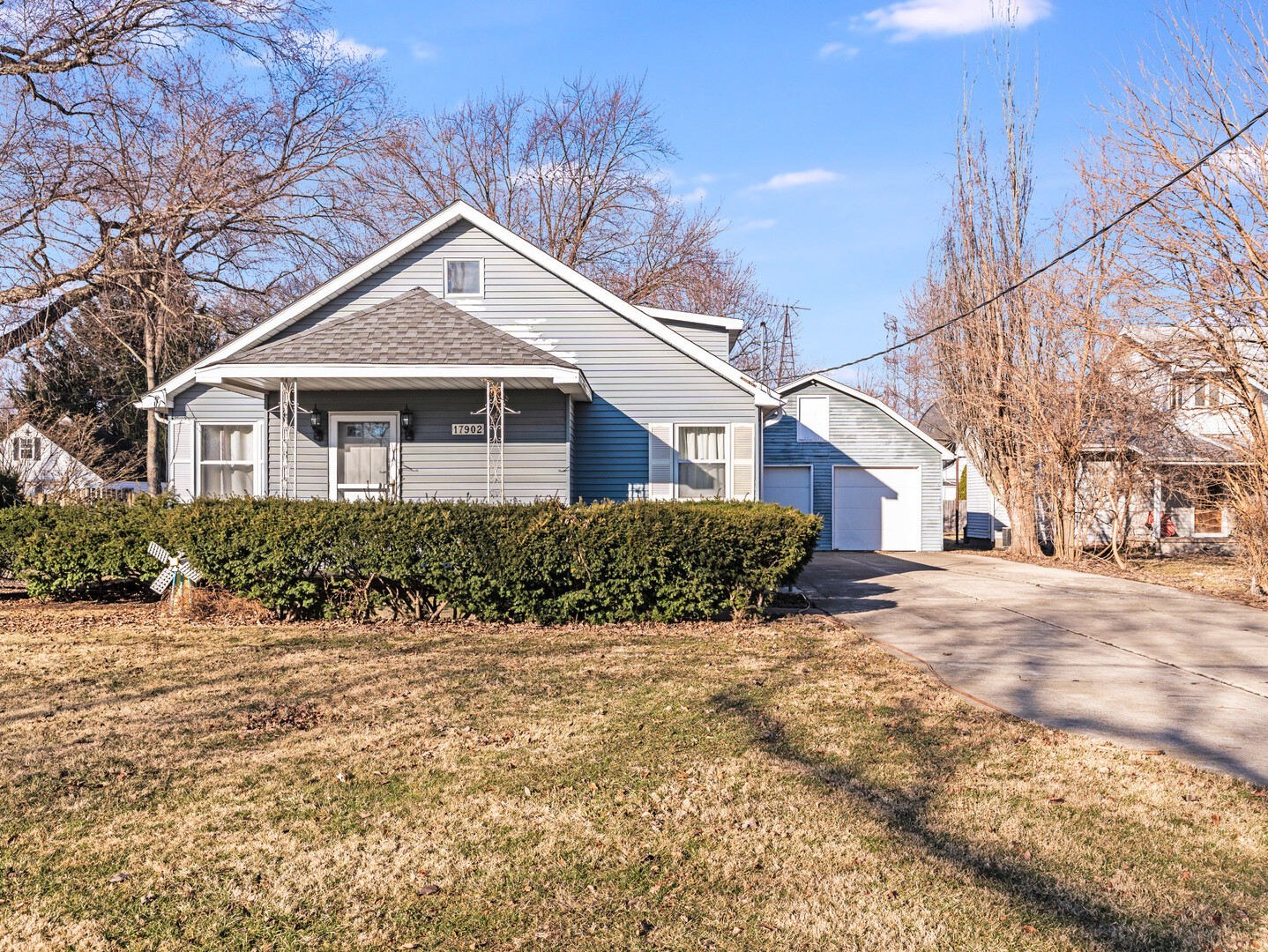 17902 Locust Street Lansing, IL 60438 - Photo 2 of 15 a front view of a house with a yard