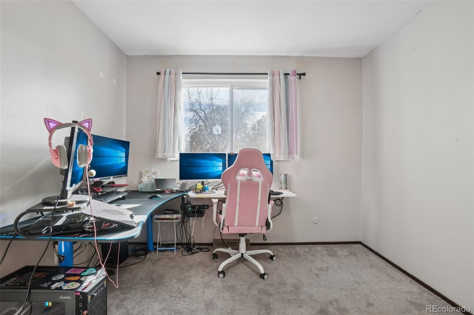16646 East Rice Circle Aurora, CO 80015 - Photo 23 of 39 a view of a workspace with furniture and a window