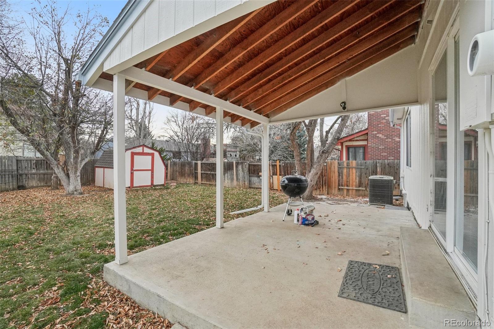 16646 East Rice Circle Aurora, CO 80015 - Photo 28 of 39 a view of a backyard with wooden fence