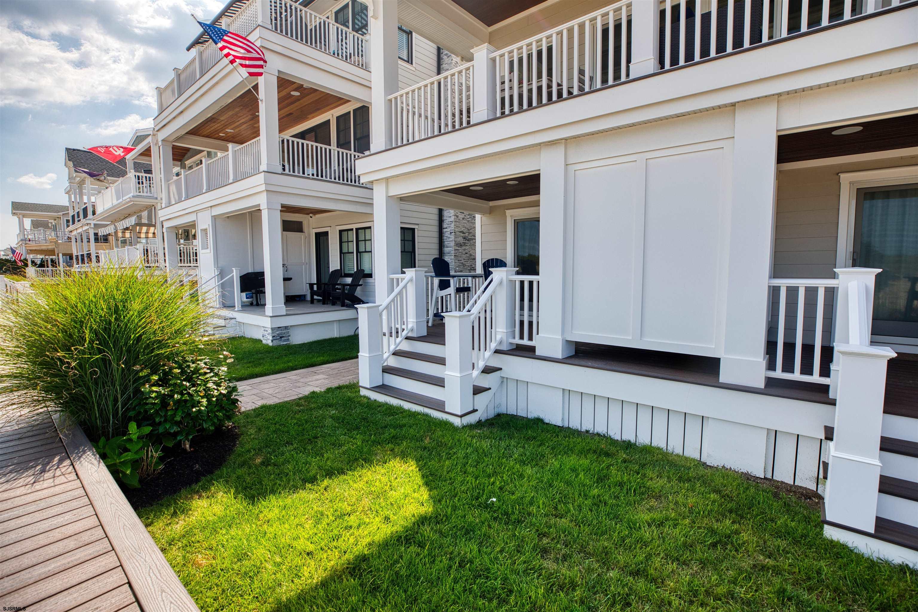 3913 Central Avenue, Unit A Ocean City, NJ 08226 - Photo 29 of 31 a view of a house with a yard porch and sitting area