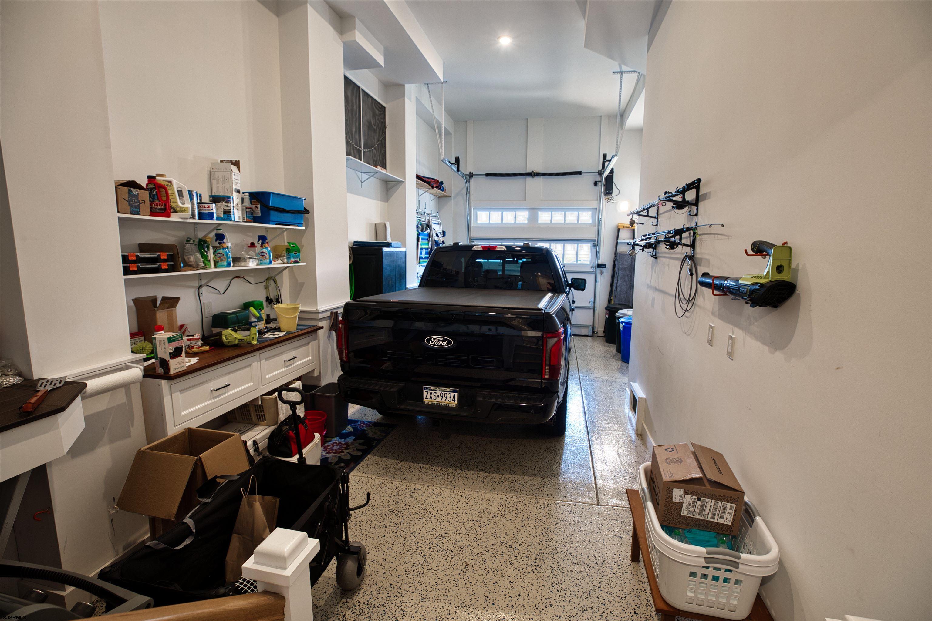 3913 Central Avenue, Unit A Ocean City, NJ 08226 - Photo 31 of 31 a room with furniture a rug toys and a ceiling fan