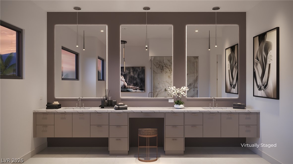 505 Overlook Rim Drive Henderson, NV 89012 - Photo 14 of 22 Spacious vanity with dual sinks, offering ample preparation space.