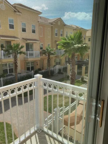 a view of a glass building with glass windows