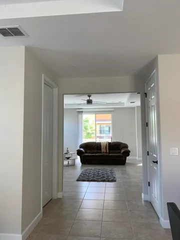 a living room with a couch and a table