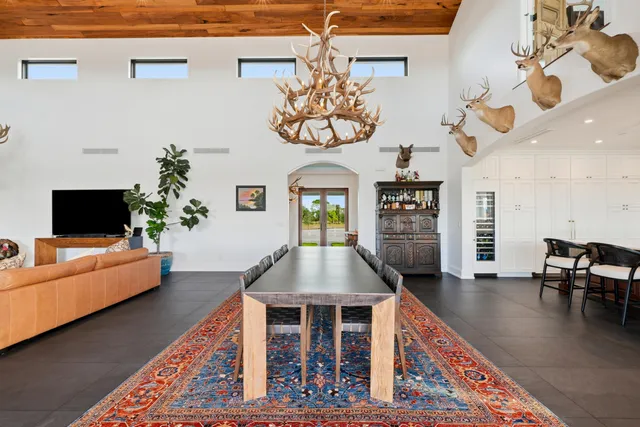 a kitchen with stainless steel appliances a stove sink and cabinets