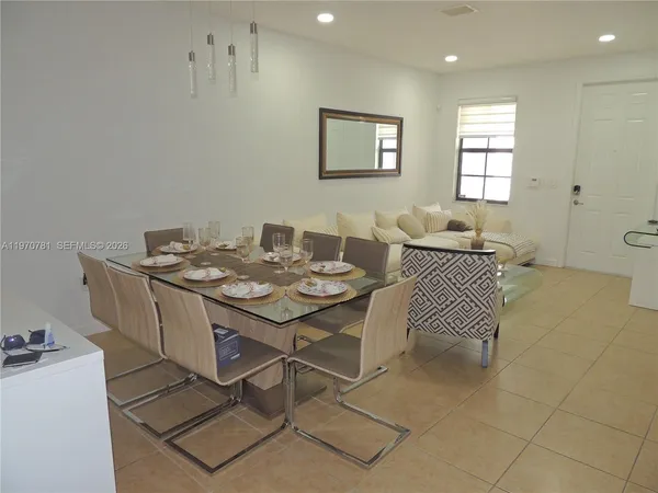 a table and chairs in a room