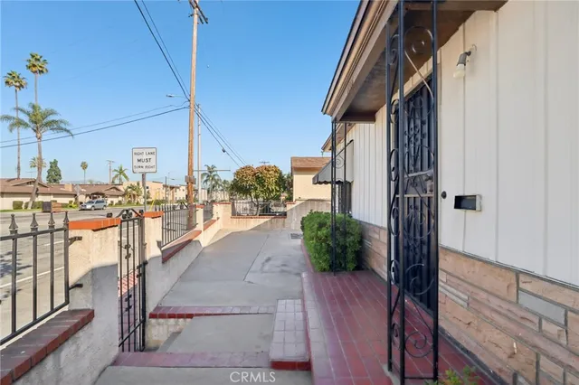 a view of street from balcony