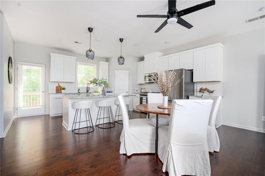 1444 Ridgebend Way Southeast Mableton, GA 30126 - Photo 12 of 34 a view of kitchen with cabinets and wooden floor