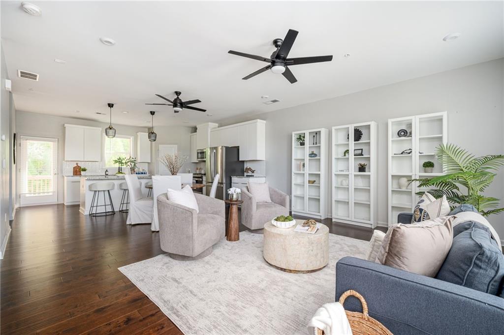 1444 Ridgebend Way Southeast Mableton, GA 30126 - Photo 20 of 34 a living room with furniture and a large window