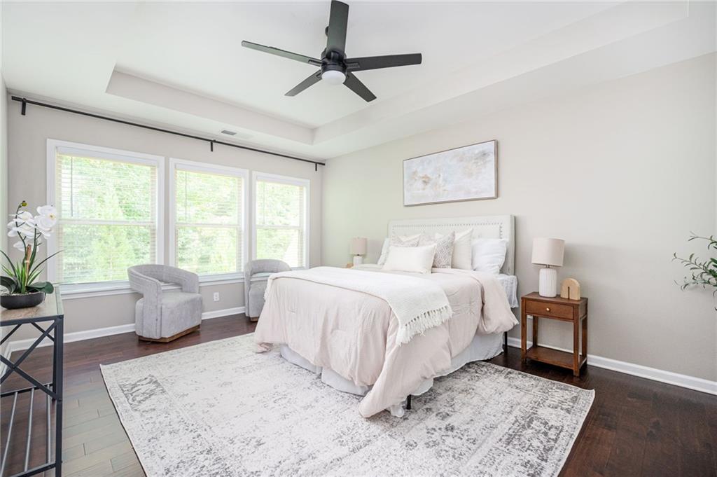 1444 Ridgebend Way Southeast Mableton, GA 30126 - Photo 21 of 34 a bedroom with a large bed and a couch