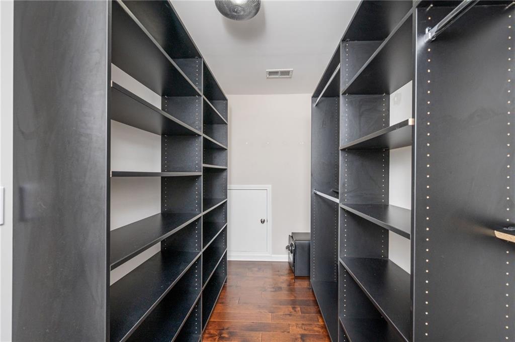 1444 Ridgebend Way Southeast Mableton, GA 30126 - Photo 26 of 34 a view of closet with empty racks