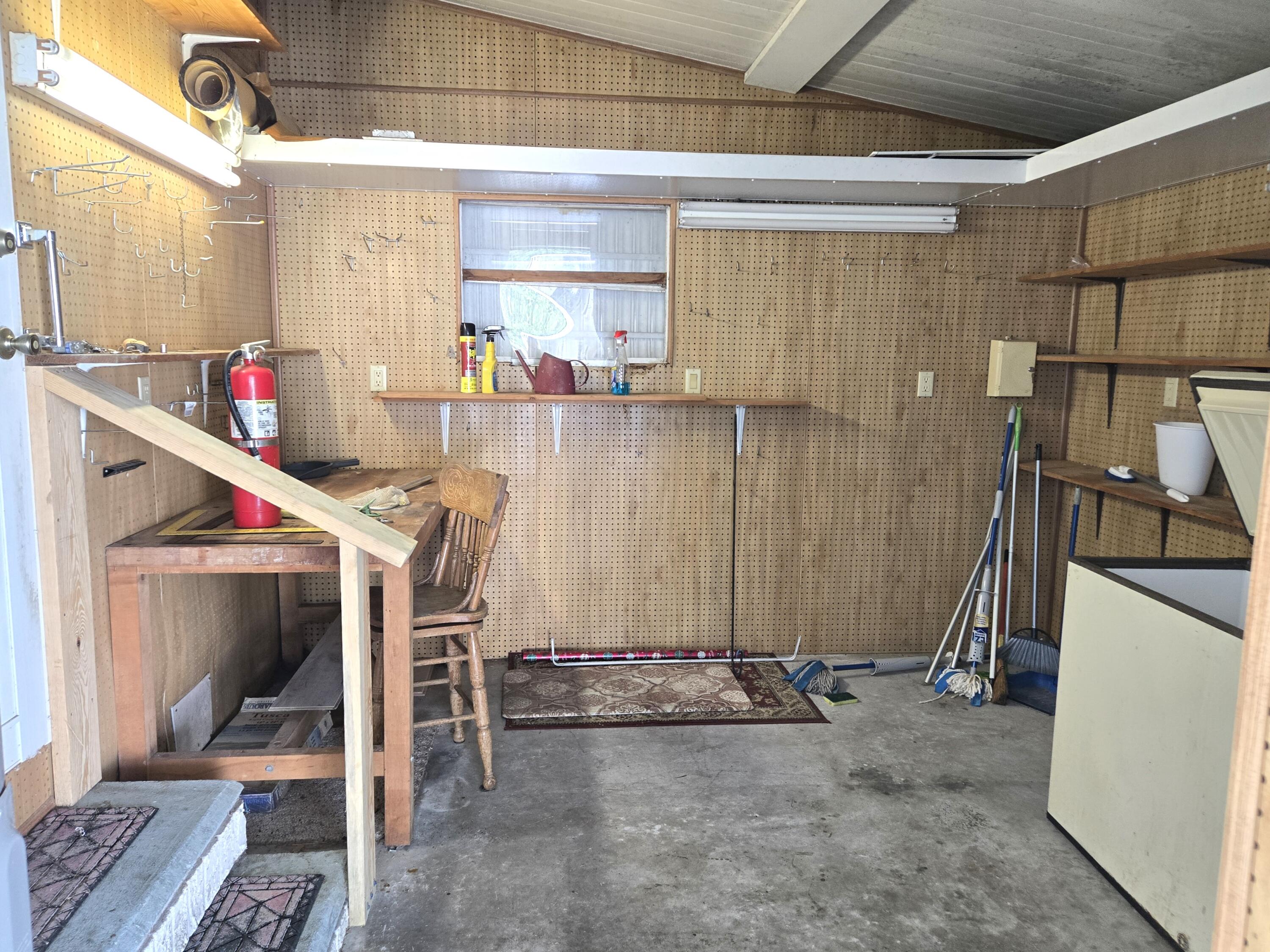 1586 Southwest 35th Circle Okeechobee, FL 34974 - Photo 32 of 37 a view of storage and utility room