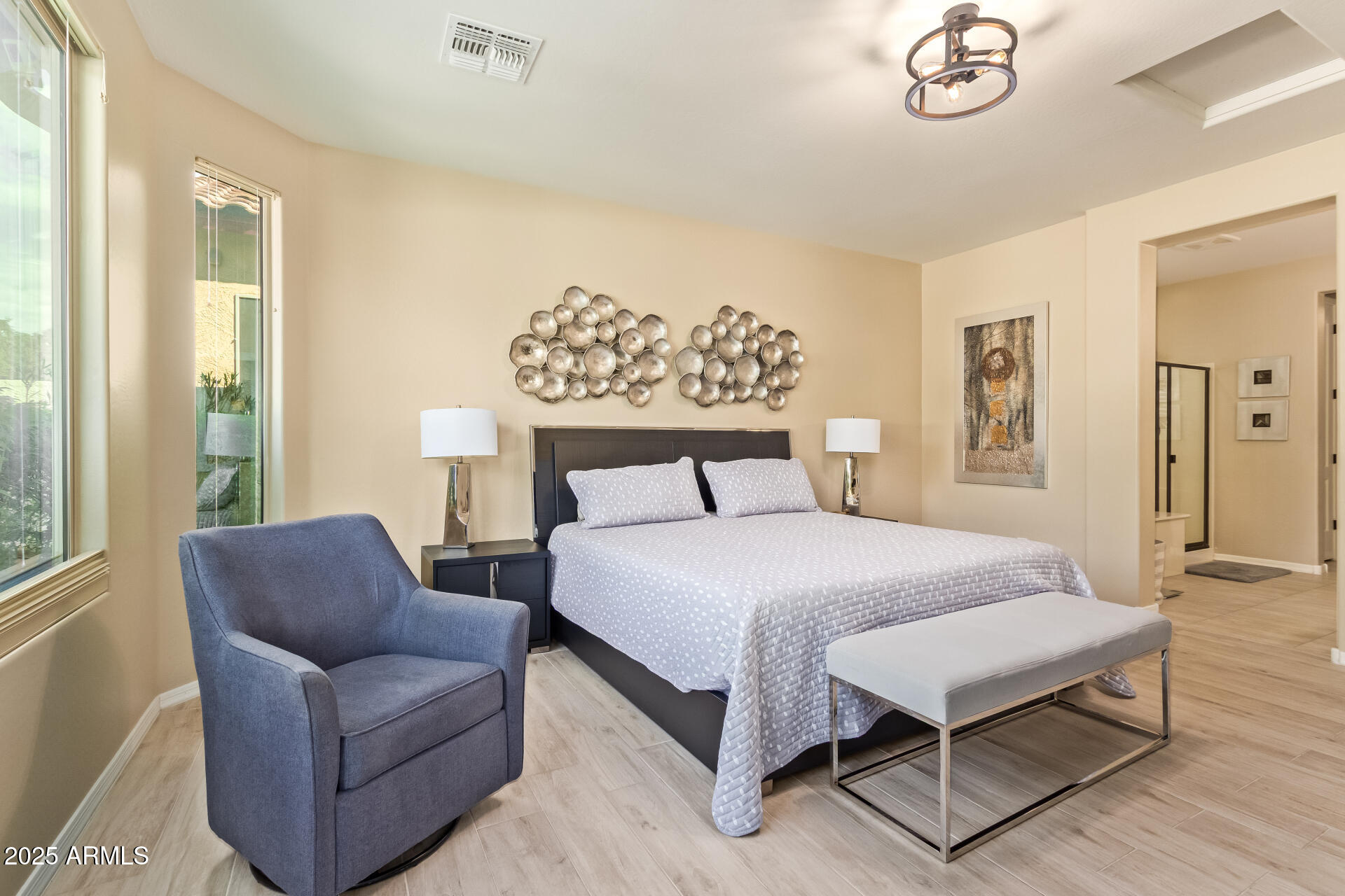 3516 East Megan Street Gilbert, AZ 85295 - Photo 22 of 60 a bedroom with a bed couch and window