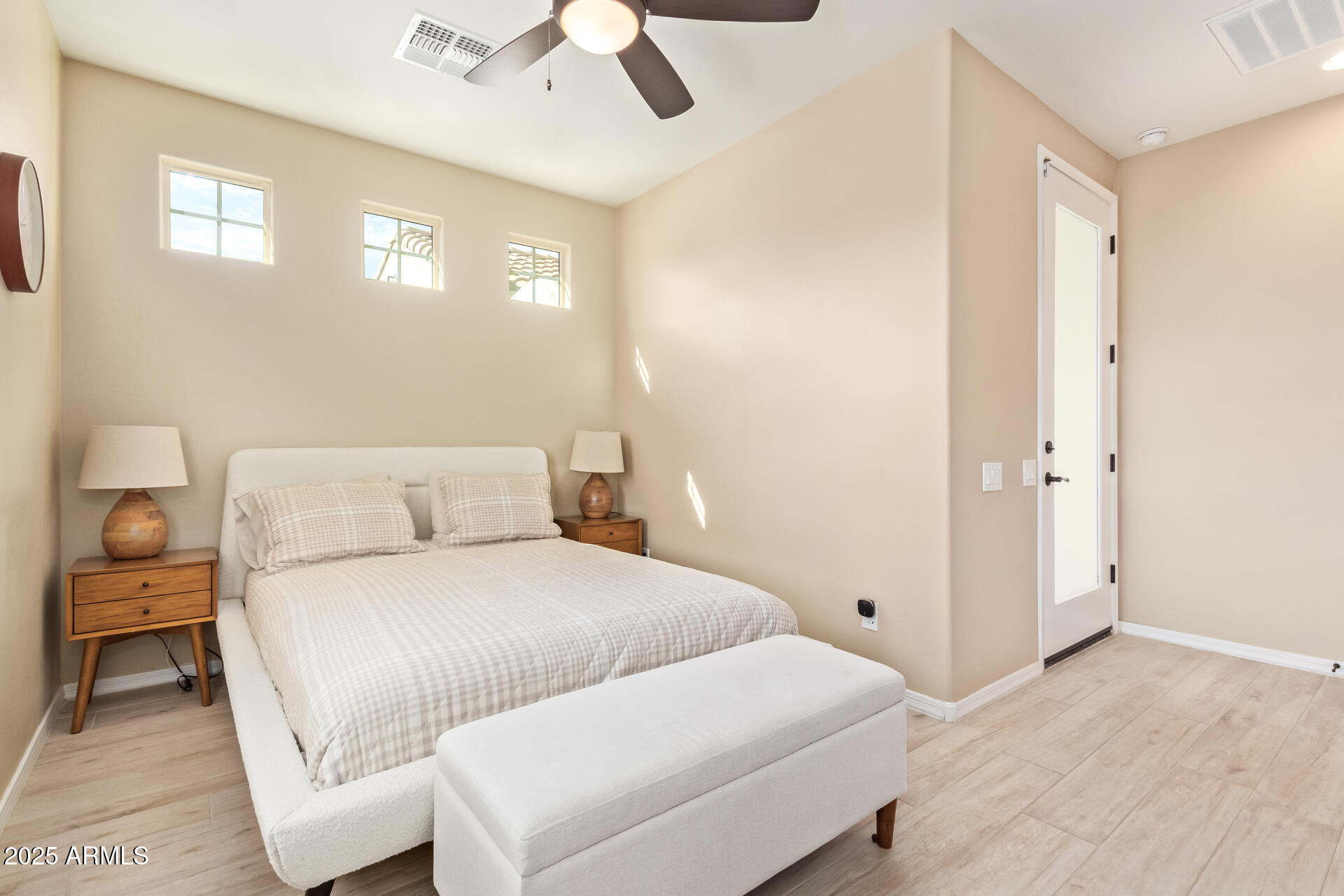 3516 East Megan Street Gilbert, AZ 85295 - Photo 30 of 60 a bedroom with a bed and a night stand