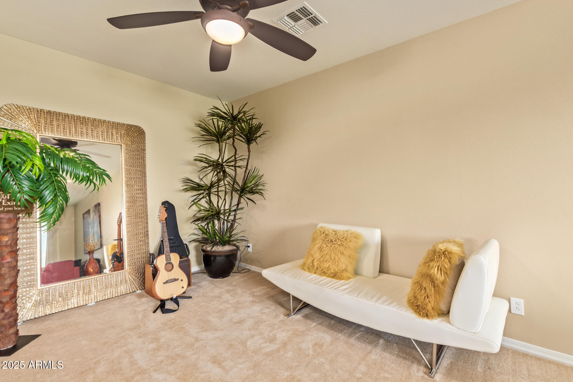3516 East Megan Street Gilbert, AZ 85295 - Photo 39 of 60 a view of living room with furniture and potted plant