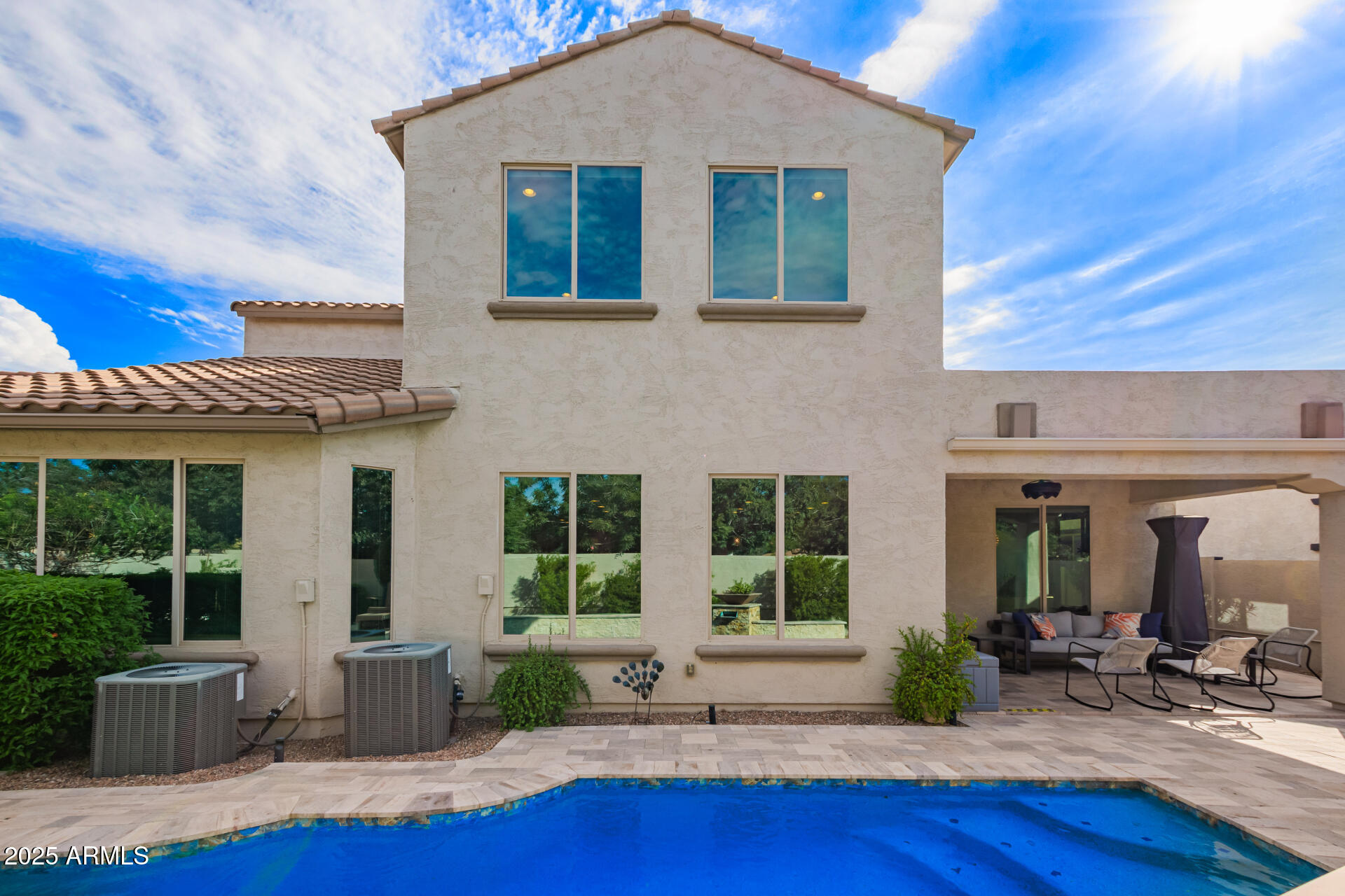 3516 East Megan Street Gilbert, AZ 85295 - Photo 48 of 60 a front view of house with yard outdoor seating and garage