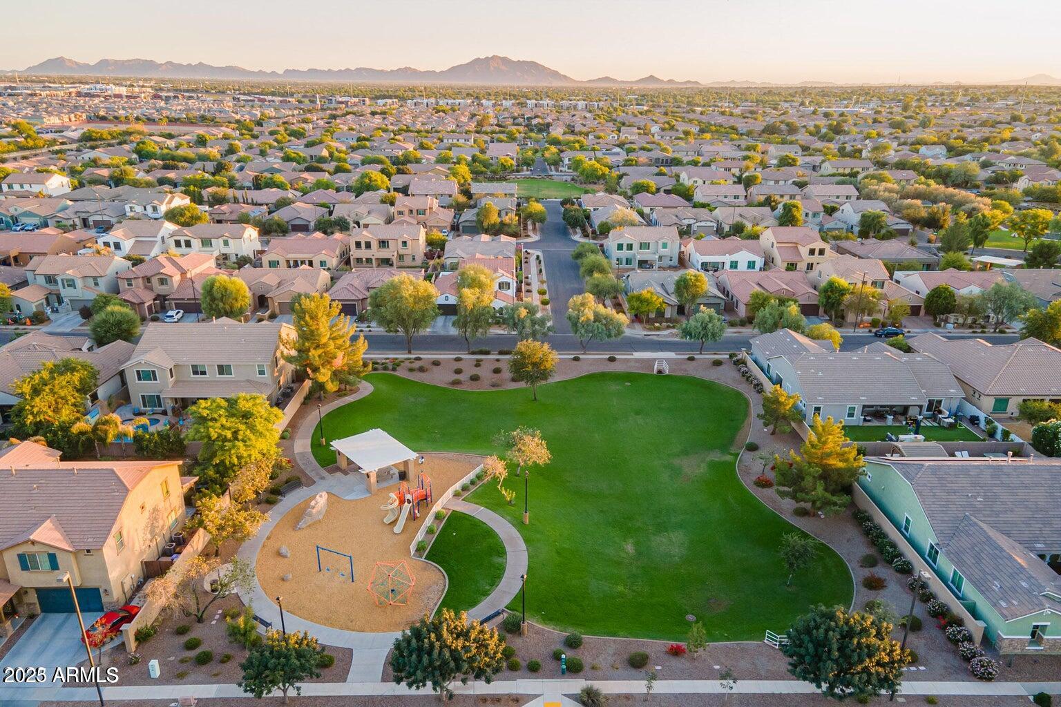 3516 East Megan Street Gilbert, AZ 85295 - Photo 51 of 60 an aerial view of residential houses with outdoor space