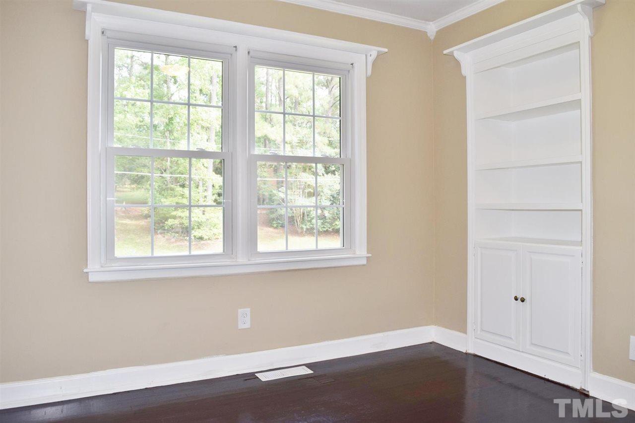 3606 Woodside Road Garner, NC 27529 - Photo 11 of 16 an empty room with a window