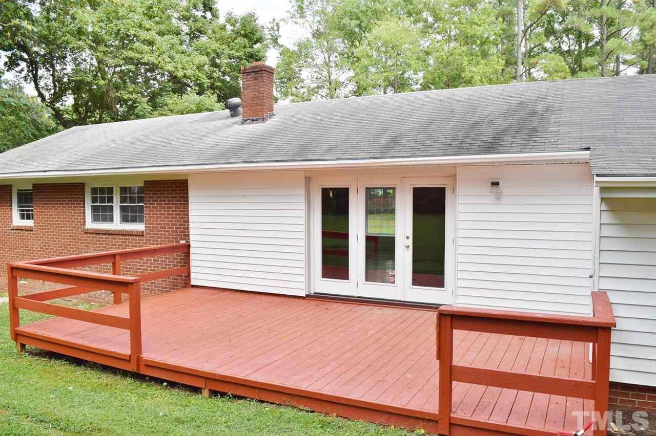 3606 Woodside Road Garner, NC 27529 - Photo 14 of 16 a backyard view of a house