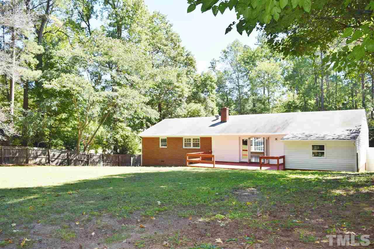 3606 Woodside Road Garner, NC 27529 - Photo 15 of 16 a view front of house with a yard