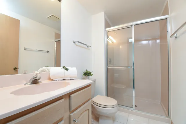 a roof deck with a table and chairs