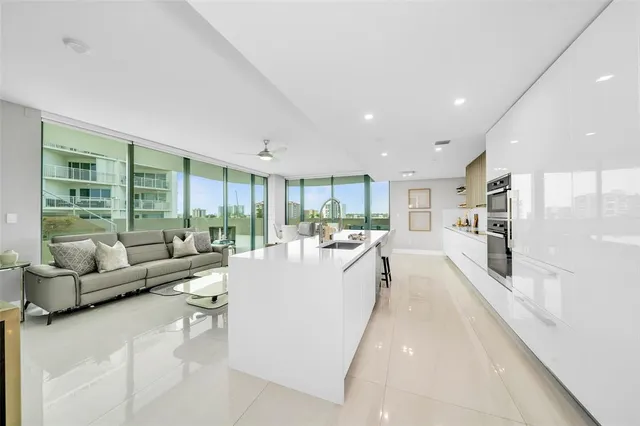 a view of a kitchen with a sink and dishwasher