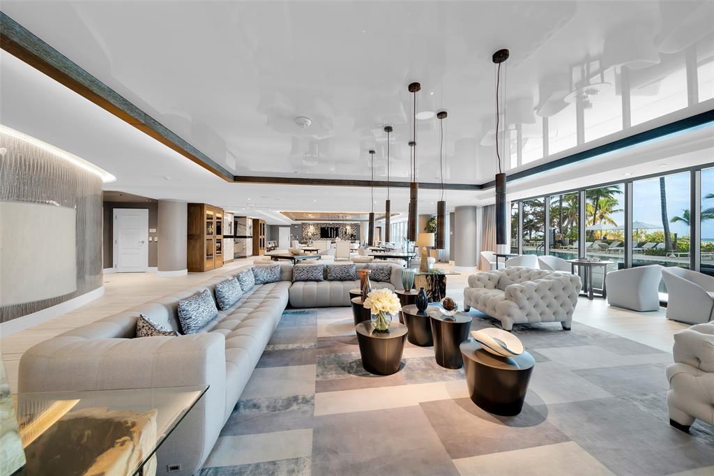 730 North Ocean Boulevard, Unit 405 Pompano Beach, FL 33062 - Photo 43 of 47 a living room with furniture and a large window