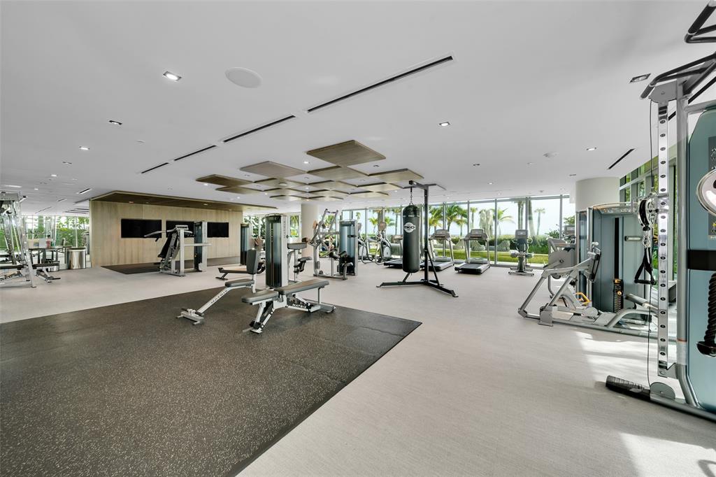 730 North Ocean Boulevard, Unit 405 Pompano Beach, FL 33062 - Photo 44 of 47 a view of a room with gym equipment