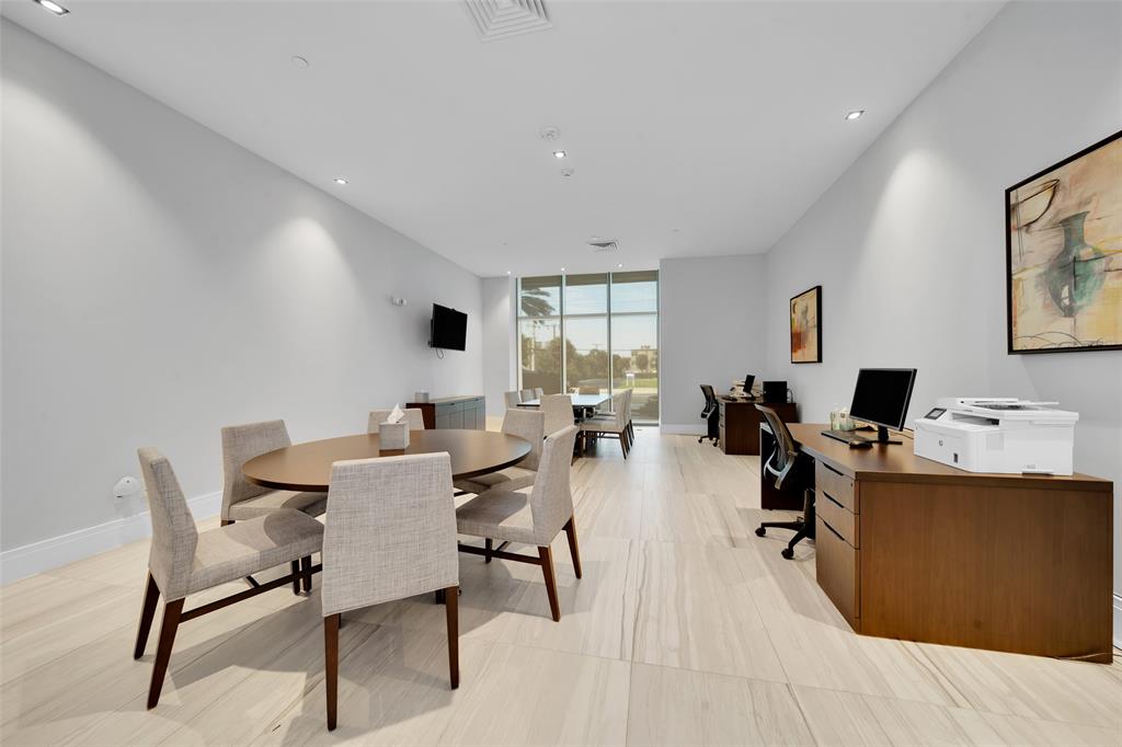 730 North Ocean Boulevard, Unit 405 Pompano Beach, FL 33062 - Photo 46 of 47 a view of a workspace with a window and sitting area