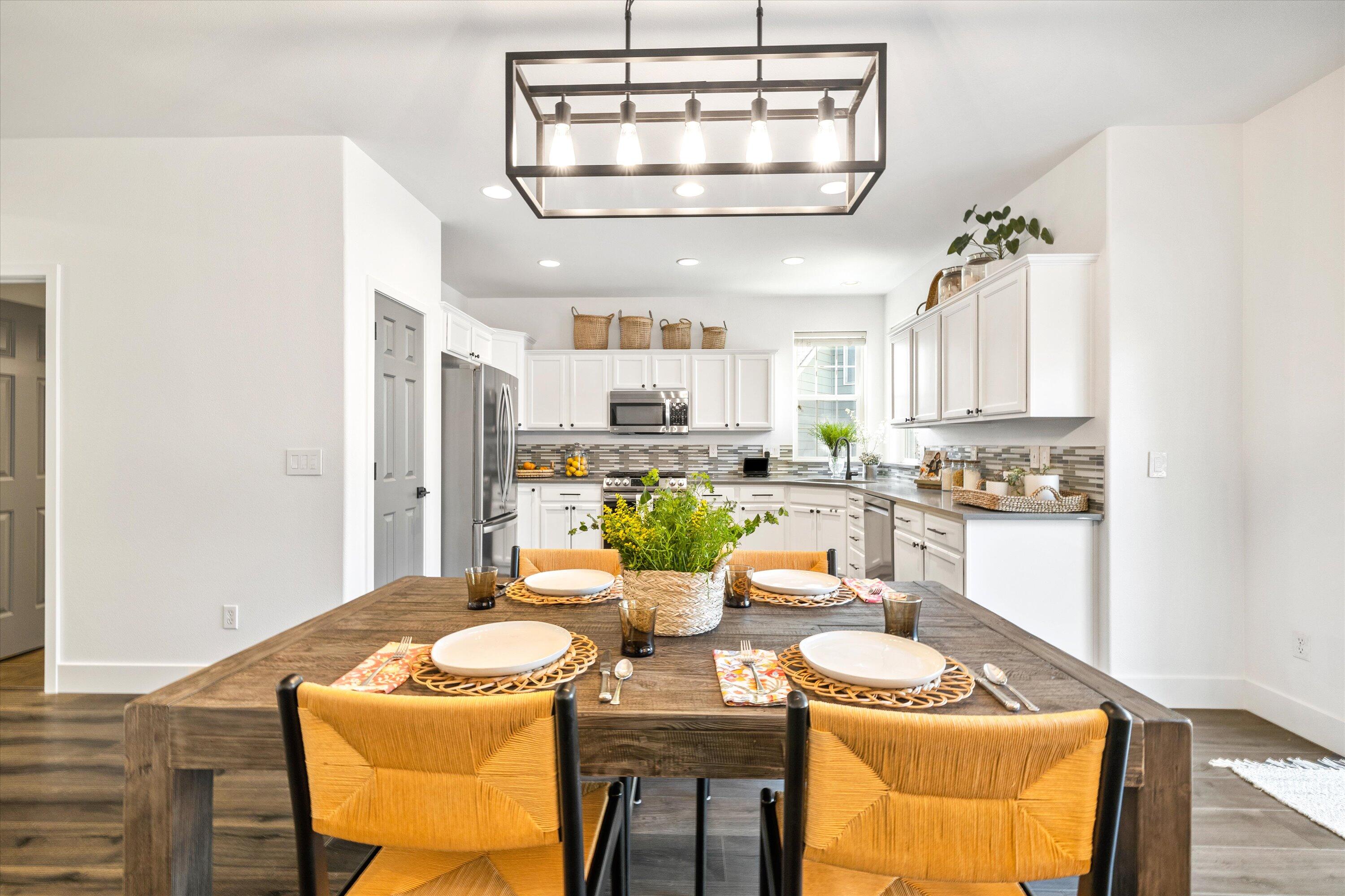 61269 Southwest Brookside Loop Bend, OR 97702 - Photo 18 of 46 Dining area with stylish new light fixture