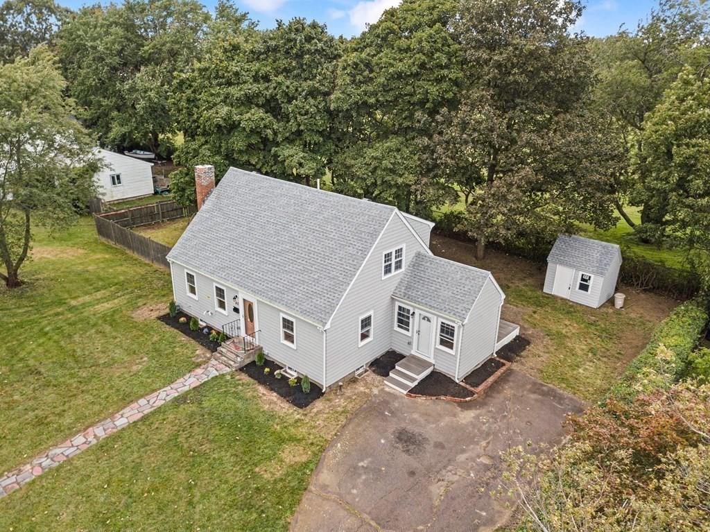 40 Howe Street Quincy, MA 02169 - Photo 3 of 42 an aerial view of a house with garden space and street view