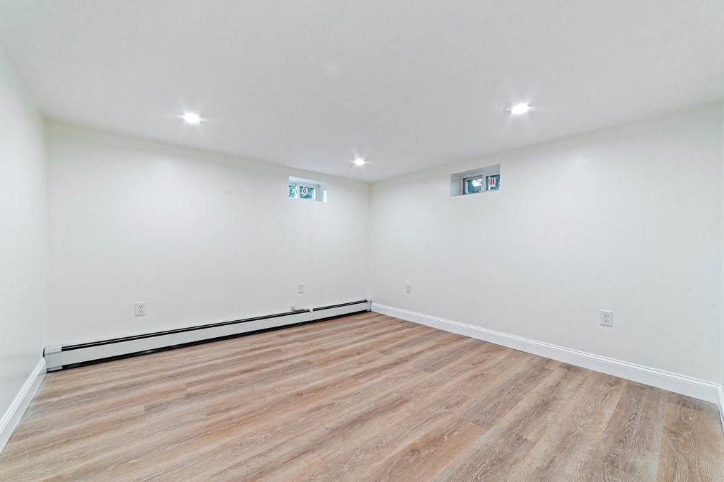 40 Howe Street Quincy, MA 02169 - Photo 39 of 42 a view of room with wooden floor