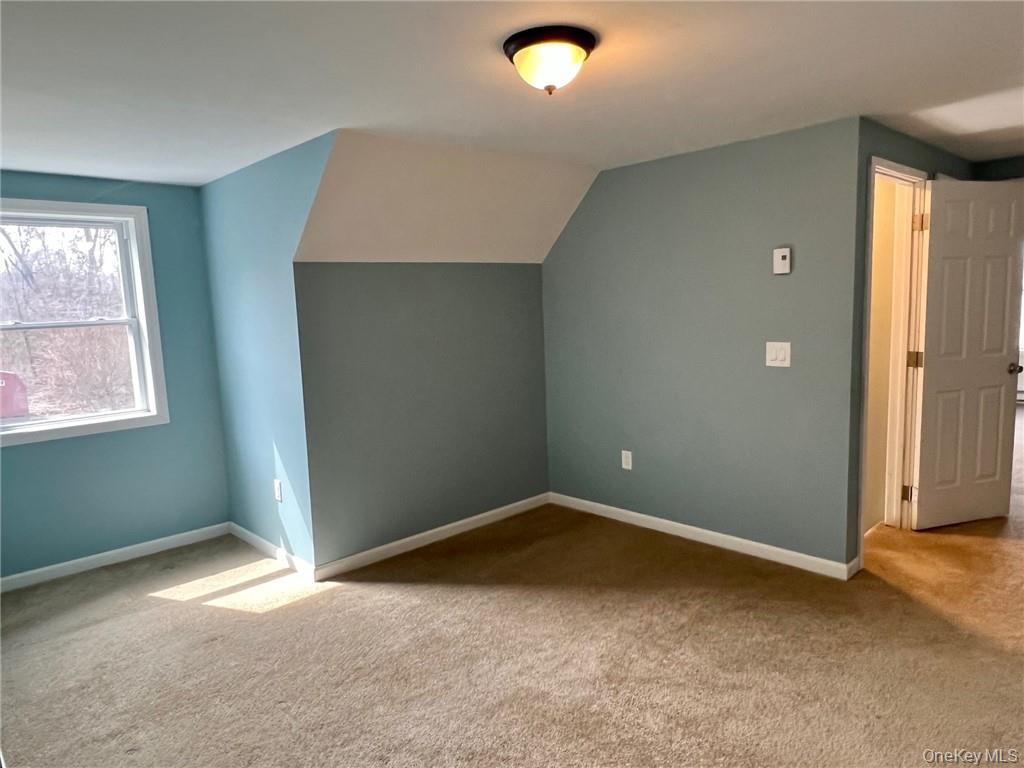 492 Midland Lake Road, Unit 2 Middletown, NY 10941 - Photo 21 of 24 an area between the two bedrooms that can be used as a playroom, rec room.