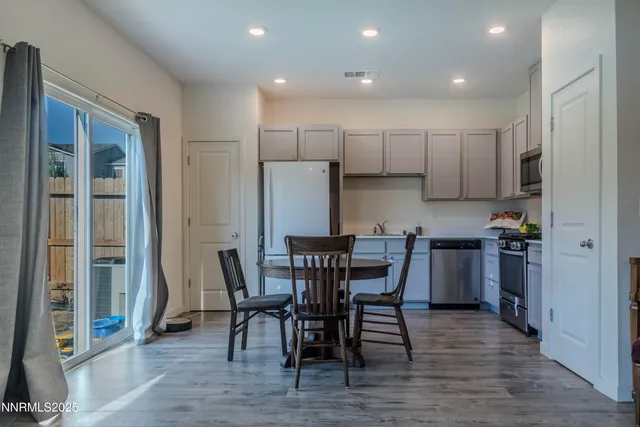 a kitchen with refrigerator a stove top oven and refrigerator