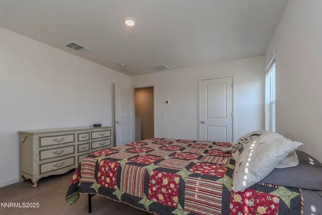 a bathroom with a sink a light fixture and a mirror