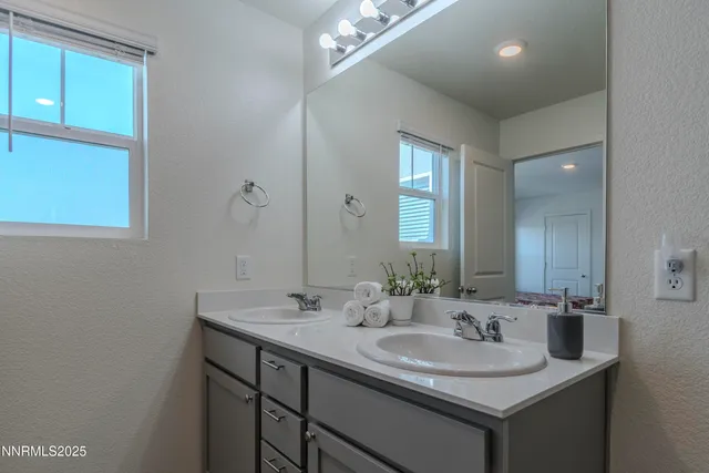 a bedroom with a bed and a cabinets