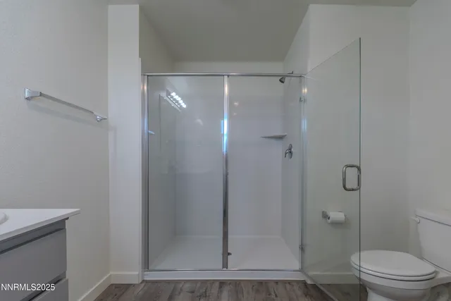 a view of a workspace with furniture and closet