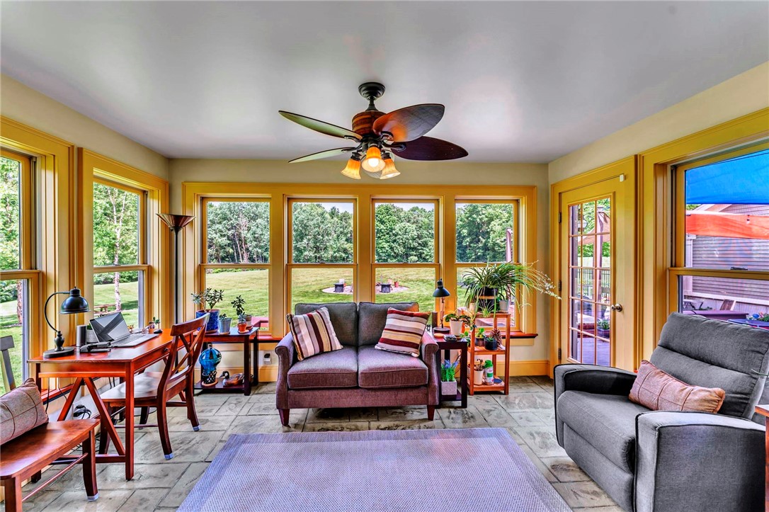 287 Pink Street Middlefield, NY 13326 - Photo 10 of 49 Year around Sunroom with french door leading to de