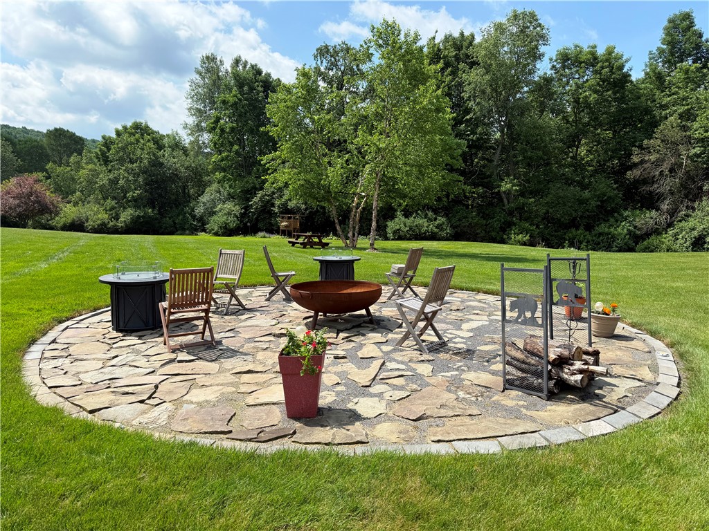 287 Pink Street Middlefield, NY 13326 - Photo 41 of 49 Private Fire Pit area with wood and two gas fire p