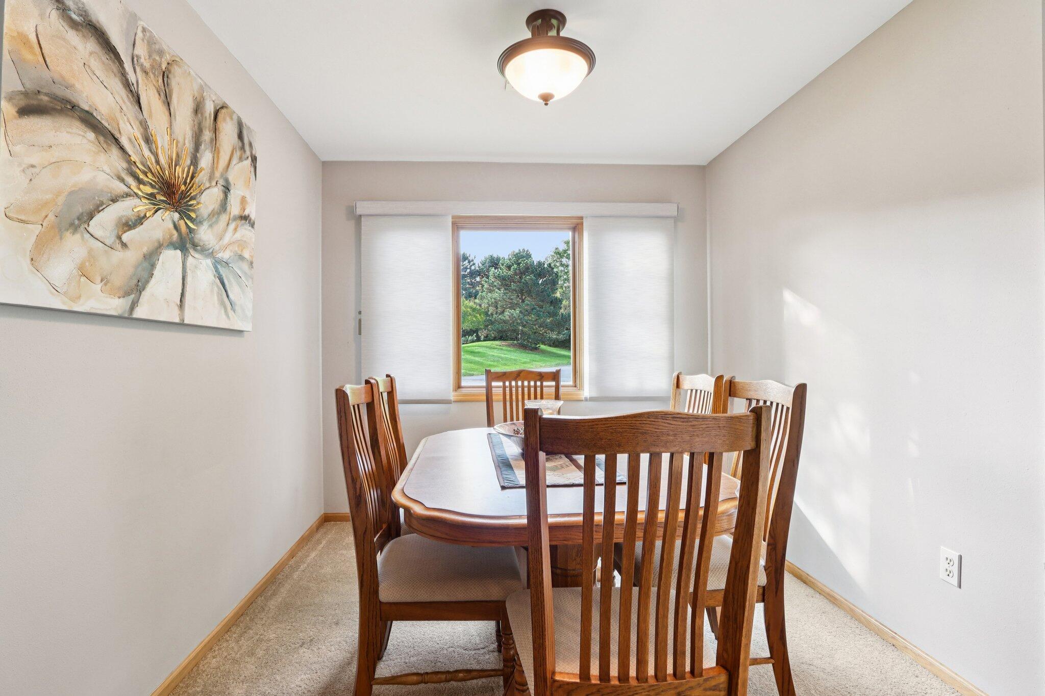 2264 Circle Ridge Road, Unit E Delafield, WI 53018 - Photo 8 of 35 Sunny dining area