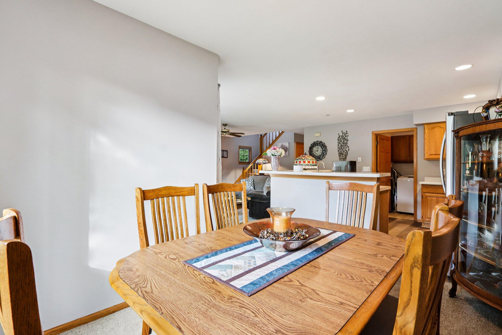 2264 Circle Ridge Road, Unit E Delafield, WI 53018 - Photo 11 of 35 Dining area is open to kitchen