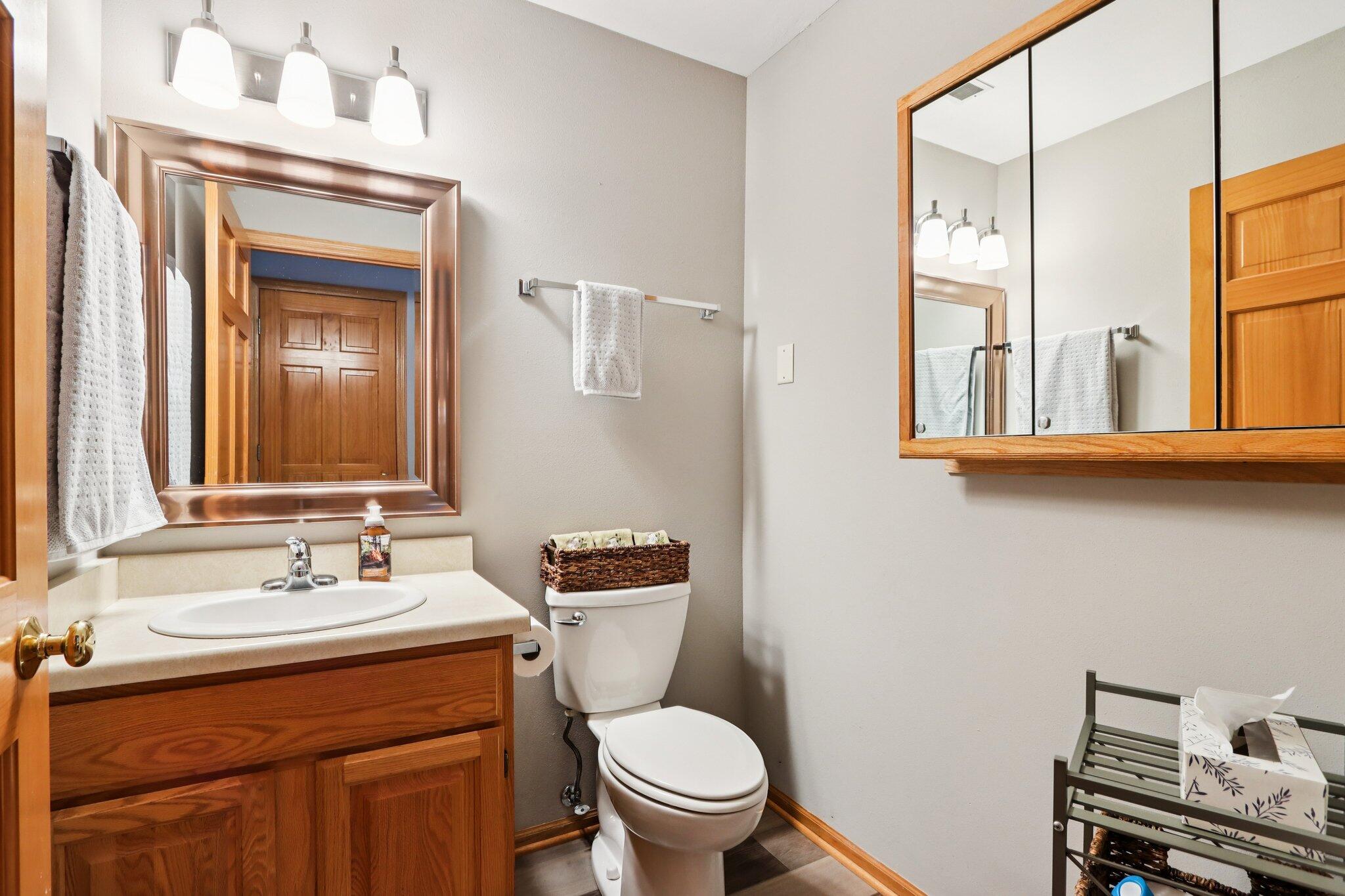 2264 Circle Ridge Road, Unit E Delafield, WI 53018 - Photo 15 of 35 Half bath on main level