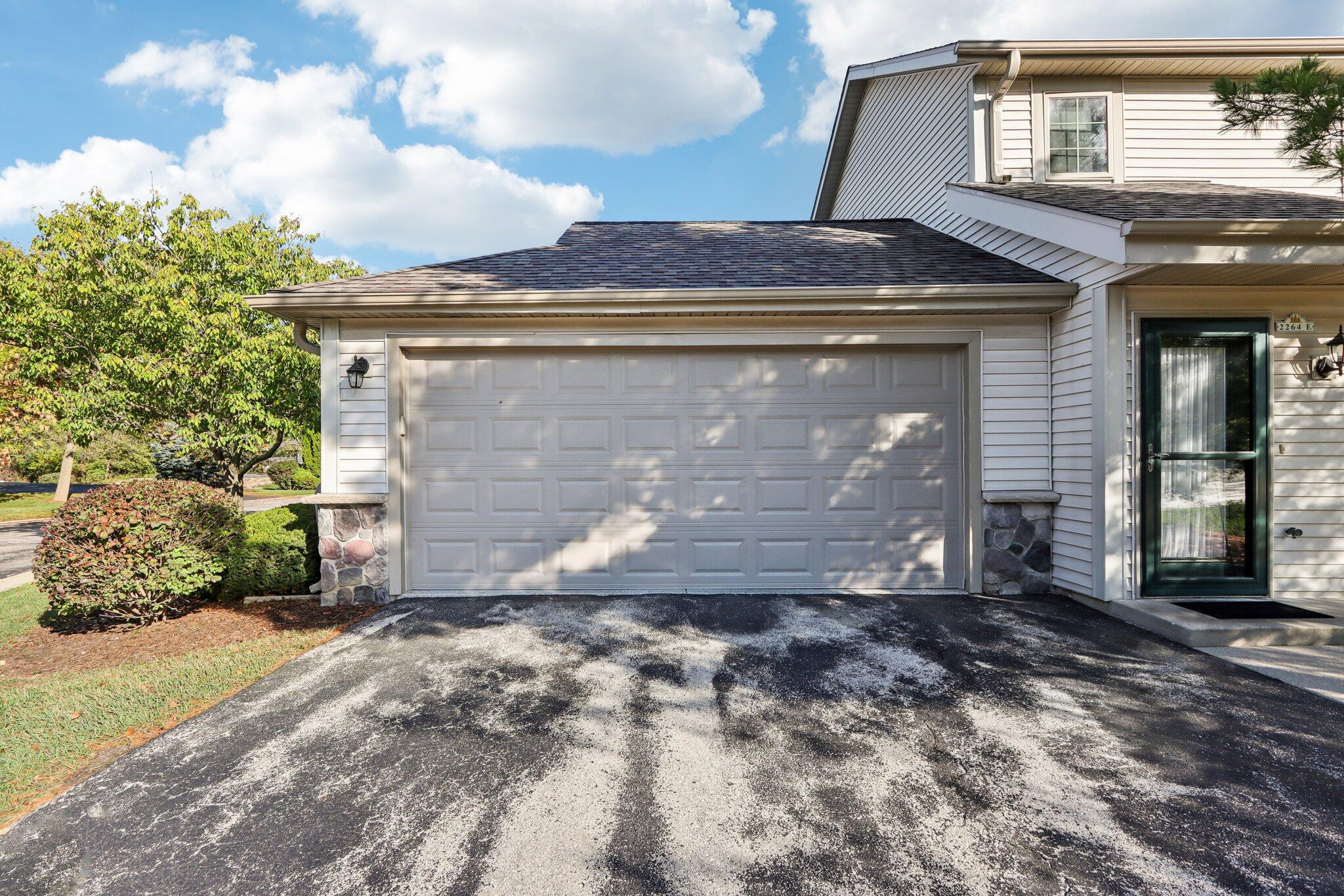 2264 Circle Ridge Road, Unit E Delafield, WI 53018 - Photo 31 of 35 Two car attached garage