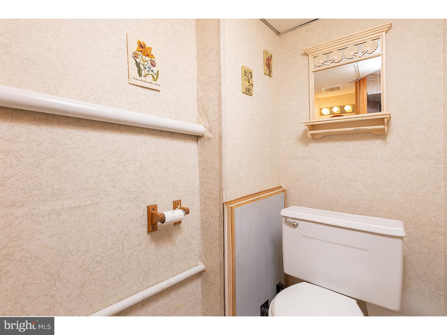 476 Fordham Road Wenonah, NJ 08090 - Photo 17 of 21 a bathroom with a toilet and a shower curtain