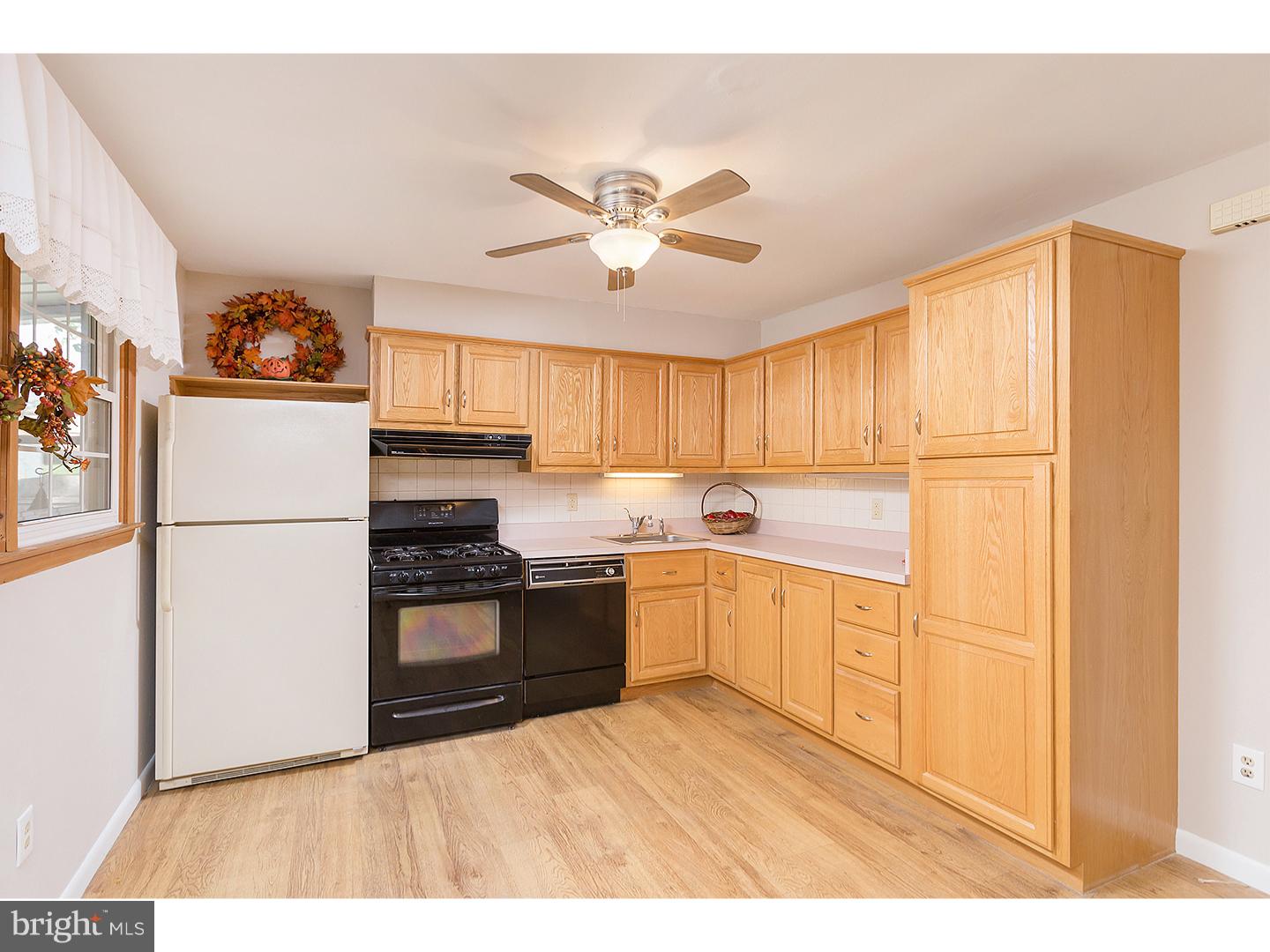 476 Fordham Road Wenonah, NJ 08090 - Photo 8 of 21 a kitchen with stainless steel appliances granite countertop a refrigerator a stove a sink and a microwave